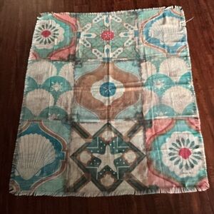 Throw blanket featuring a bohemian or coastal style pattern